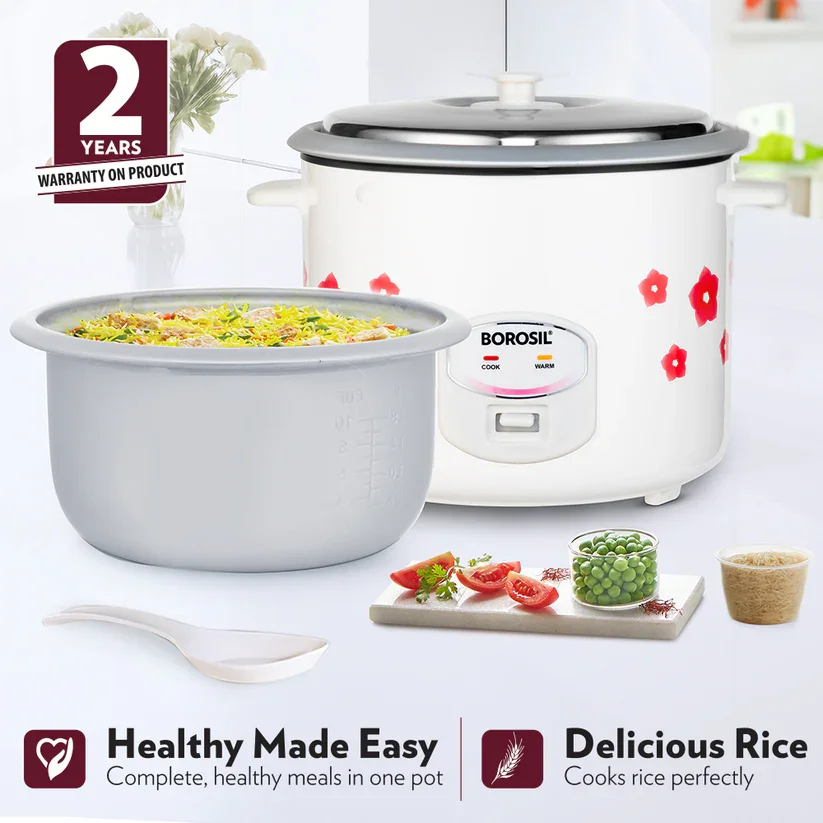 Open view revealing non-stick cooking pot and included steamer attachment