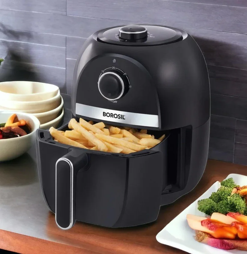 Borosil Air Fryer preparing a healthy roasted meal in a modern kitchen setting